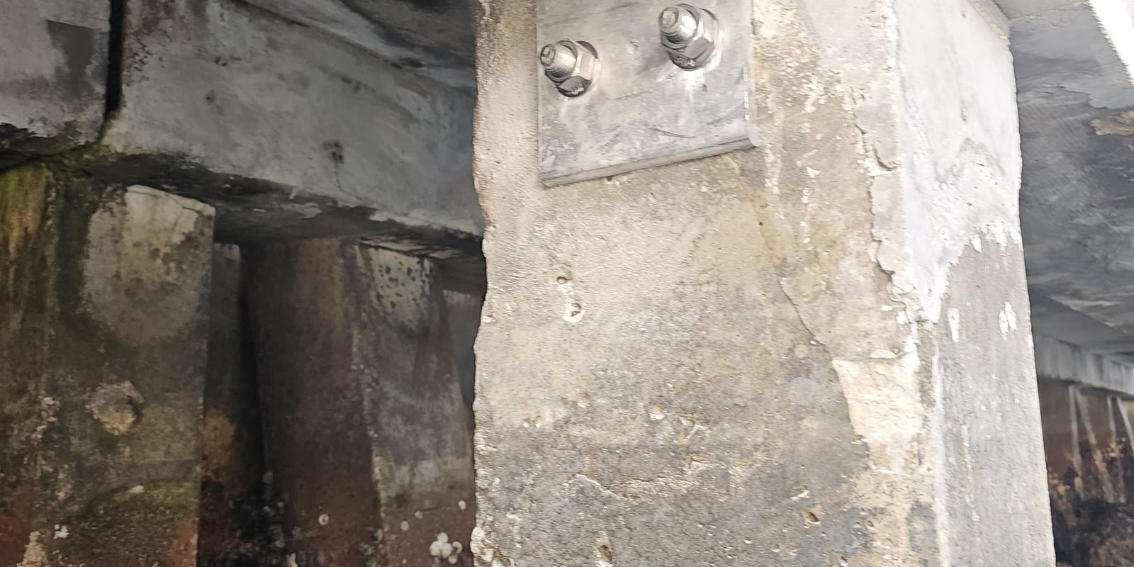 Vinyl vs. Concrete Seawall Caps: Which Holds Up in HVHZ